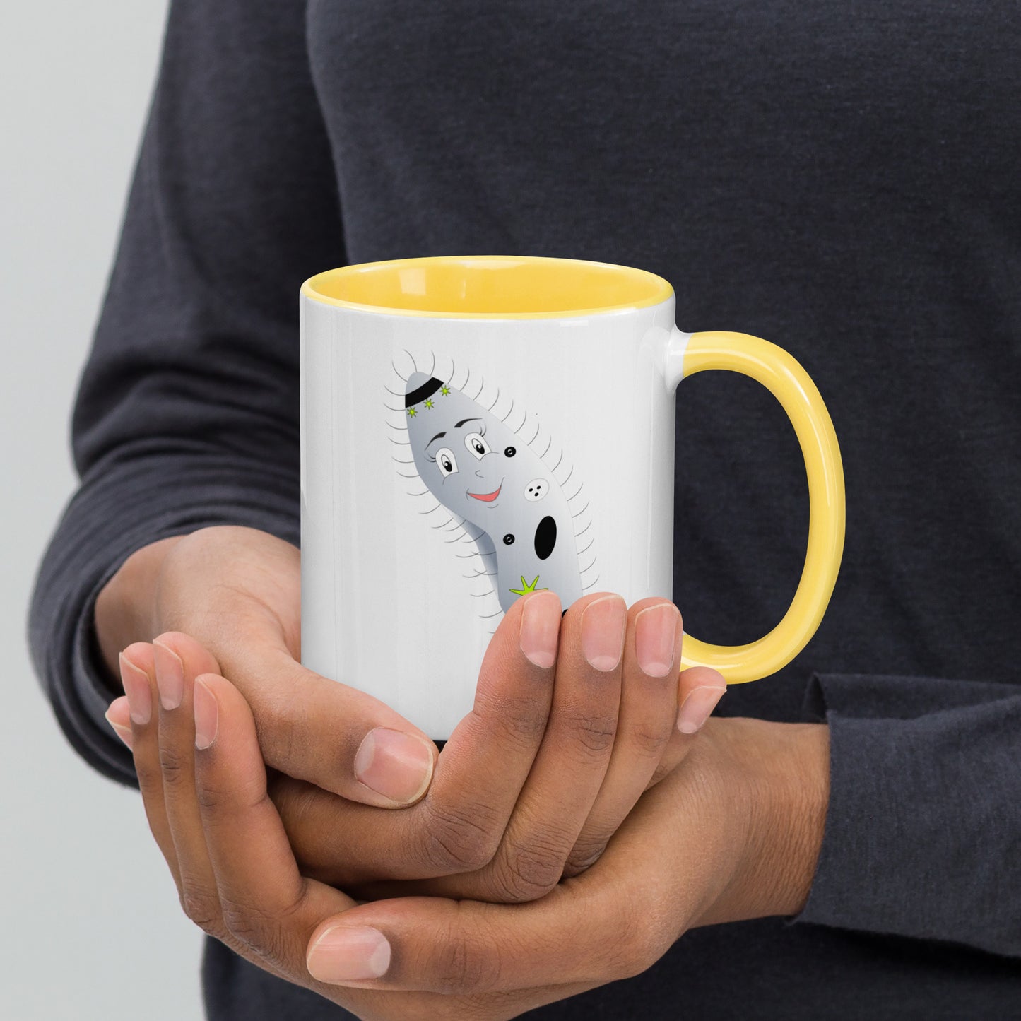 Mug featuring a whimsical cartoon image of an paramecium and a burst of color inside.