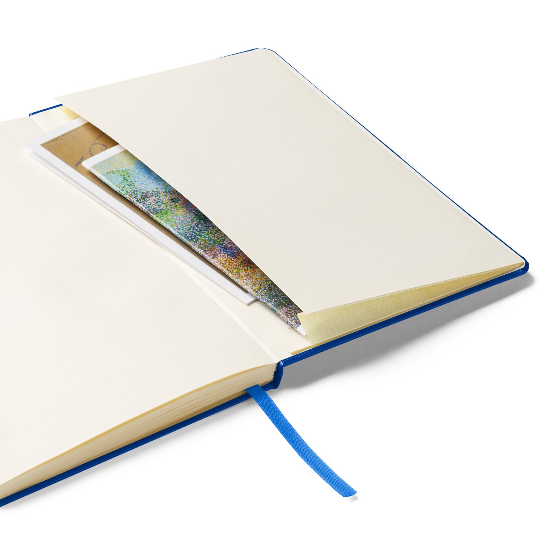 Notebook featuring 80 lined, cream-colored pages, built-in elastic closure, and ribbon page marker